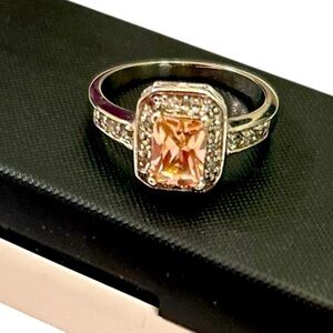 Silver tone & pink-cubic zircon emerald cut Gemstone clear surround Ring sz 8